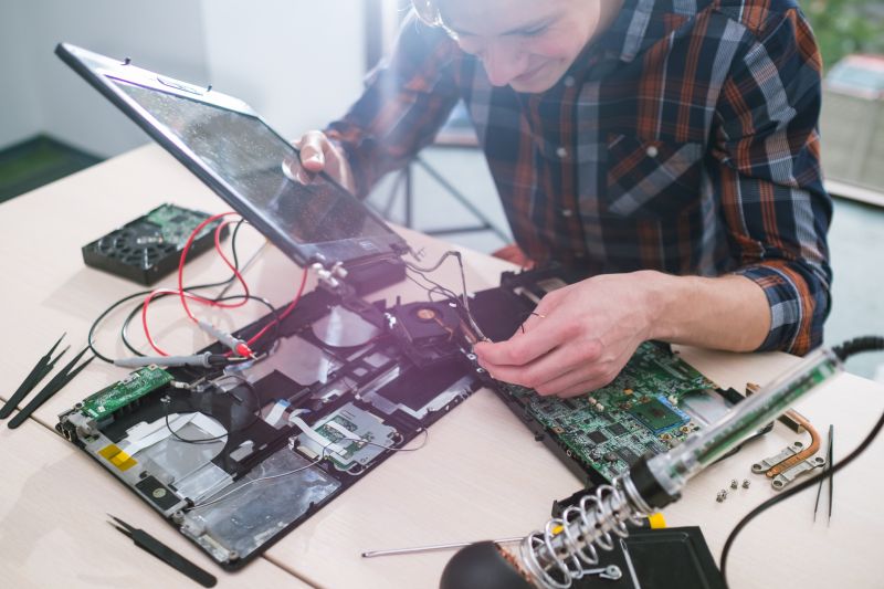 Elevator Repair Technician at Work